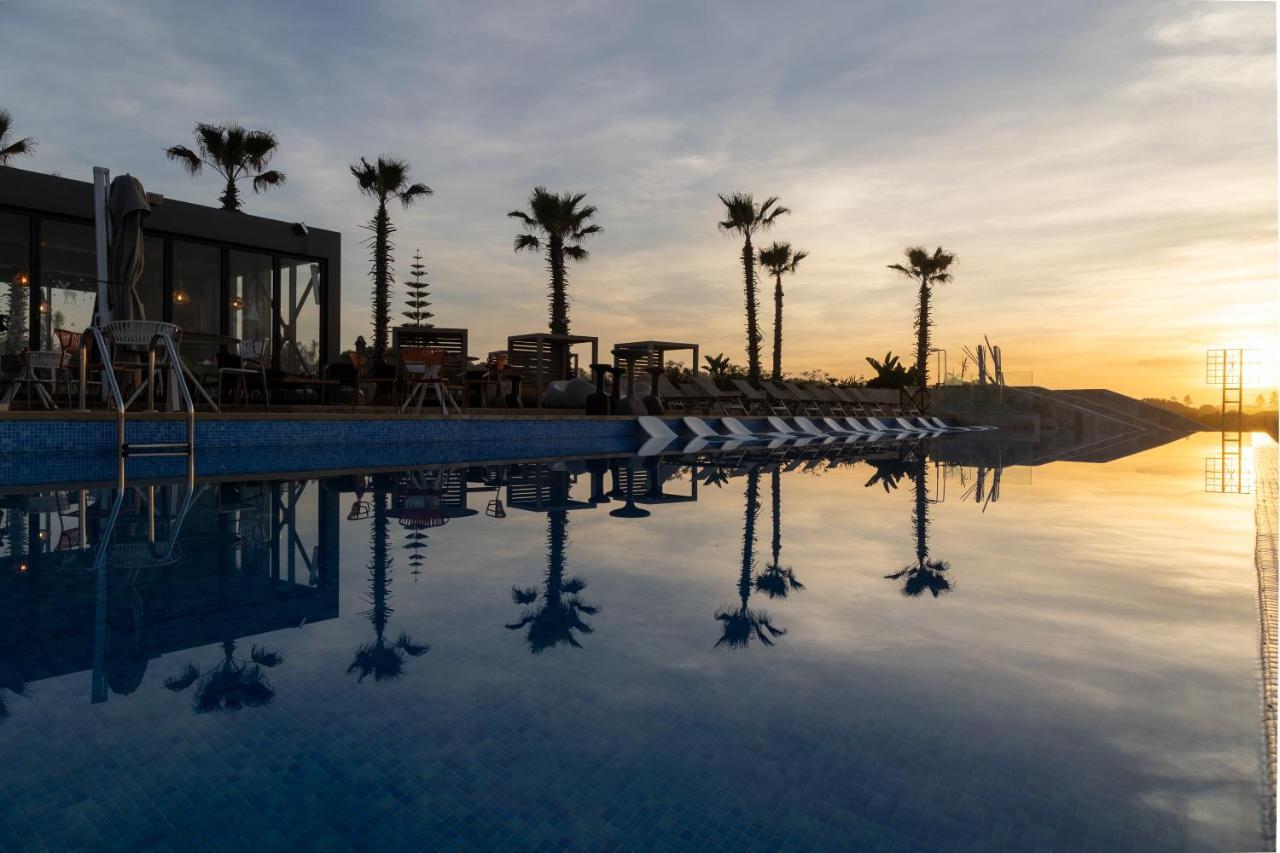 Pullman Mazagan Royal Golf&Spa El Jadida Bagian luar foto Sunset at the pool