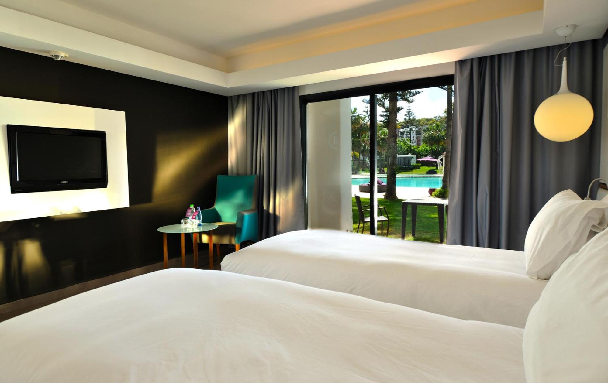 Pullman Mazagan Royal Golf&Spa El Jadida Bagian luar foto A room at the hotel